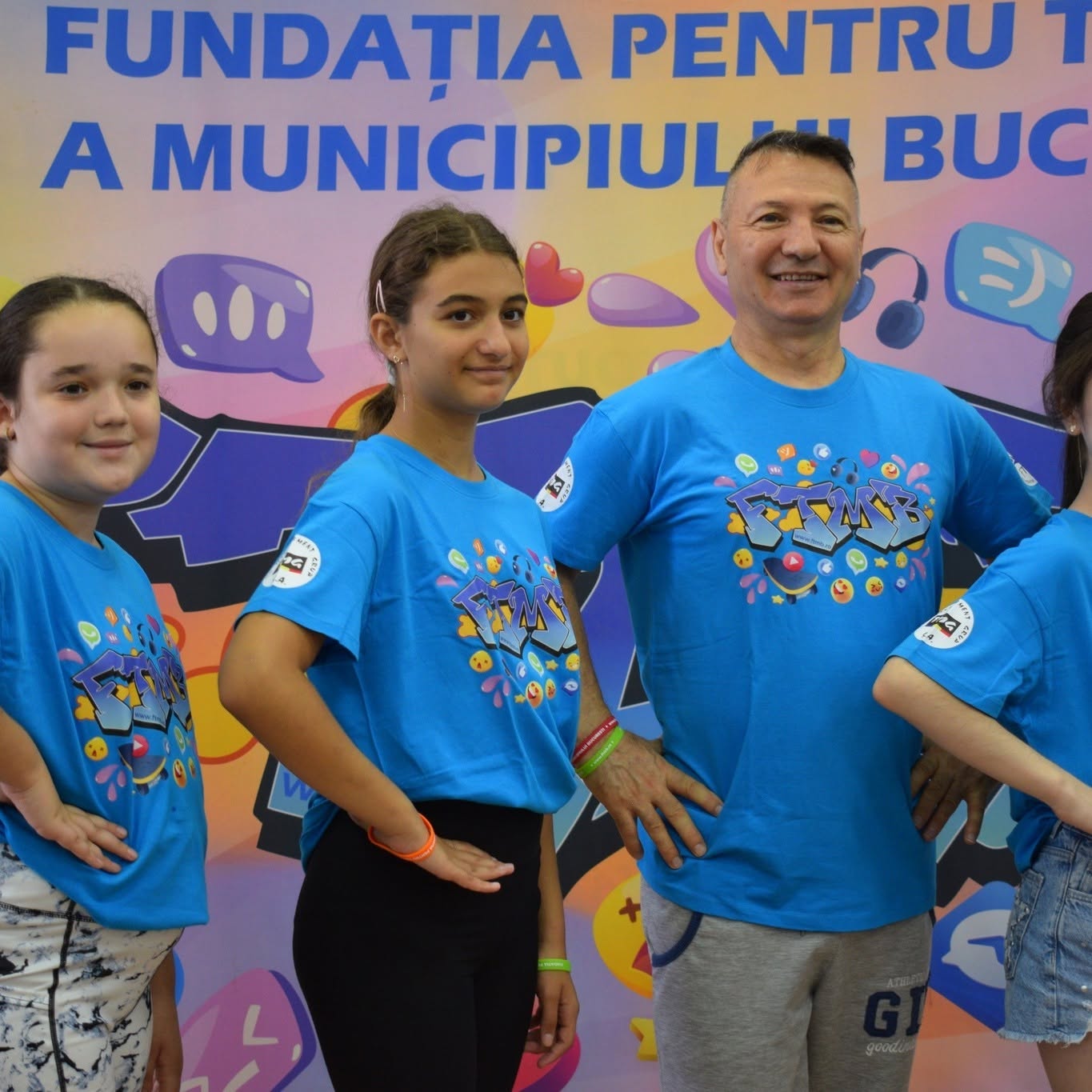 Young participants and a foundation coordinator at a youth programme day