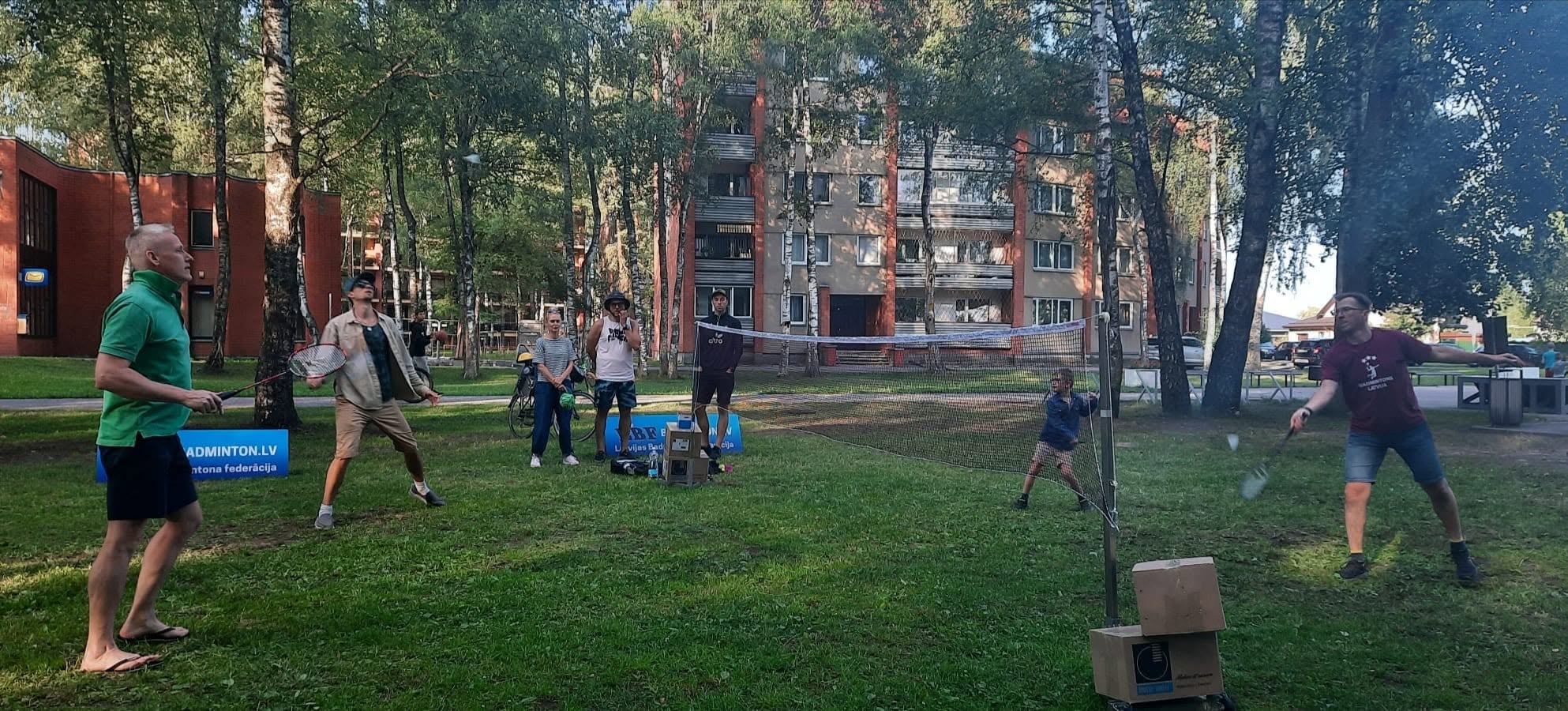 Open-air community badminton in the neighbourhood